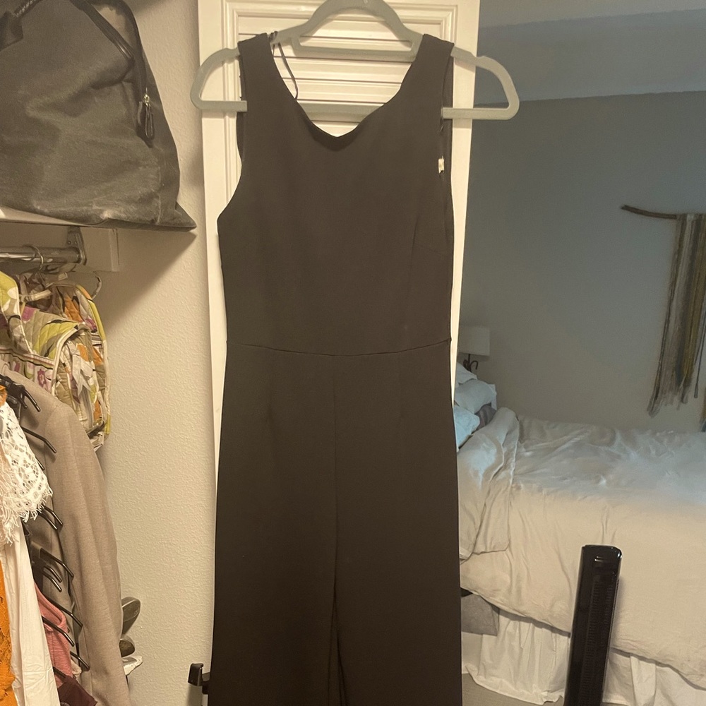Francesca’s black sleeveless jumpsuit, never worn!!